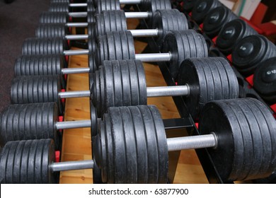 Row Of Dumbell Weights In Gym Room. For Lifting Or Fitness. 