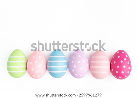 row of easter egg white background empty blank copy space april event spring celebration