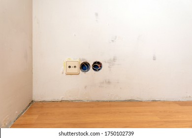 Row Of Electric Outlet Set In Bedroom Wall, TV Outlet , Cable Outlet And Electronic Plug With Asia Style On Grey Fabric Texture Wallpaper, Cable Television. Electricity Concept.