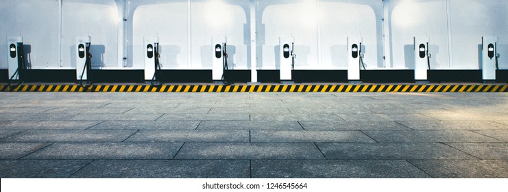 A Row Of Electric Vehicle Charging Piles At Station