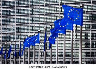 Row of EU Flags in front of the European Union Commission building in Brussels - Shutterstock ID 1939360291