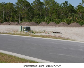 Row Of Fill Dirt Piles For Construction Site