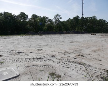 Row Of Fill Dirt Piles For Construction Site