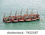 A row of fishing boats in the sea