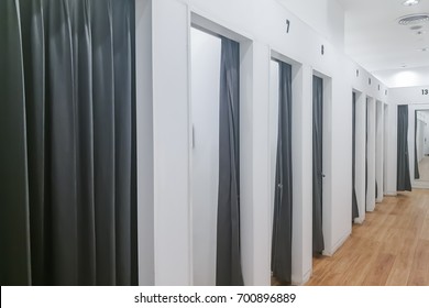 A row of Fitting room interior in a fashion department store, Nobody