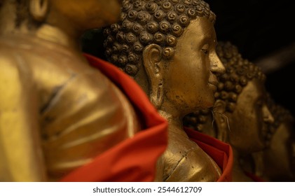 Row of golden buddha. Phuket, Thailand - Powered by Shutterstock