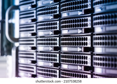 Row of hard disks used for data storage in internet data center - Shutterstock ID 2107538258