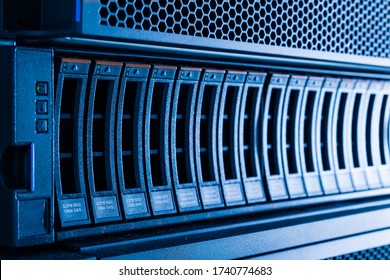 Row of hard drives serving as data storage inside server room
