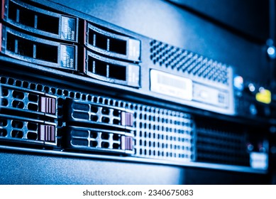 Row of hard drives serving as data storage inside server room