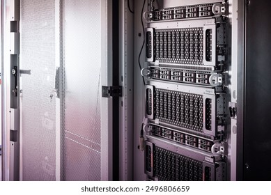 Row of hard drives serving as data storage inside server room