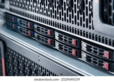 Row of hard drives serving as data storage inside server room