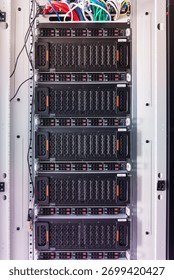 Row of hard drives serving as data storage inside server room