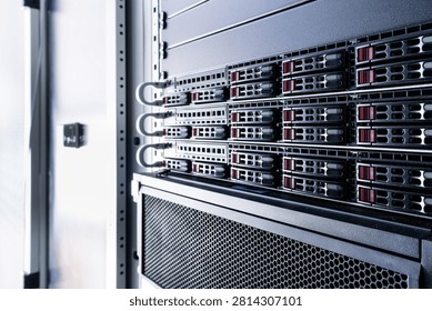Row of hard drives serving as data storage inside server room