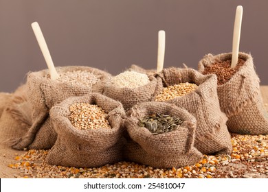 Row Healthy Grain Food (corn, Sesame, Flax, Buckwheat, Wheat, Pumpkin Seeds, Sunflower Seeds ) In Jute Sack With Wooden Spoon 