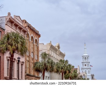 Row Of Houses On Broad Street With St Michael`s Church On The Background, Charleston, SC. 