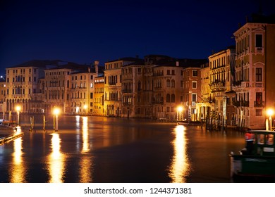 Row Of Houses With Reflection On The Canal Grande In The Night In Venice Nin Italy