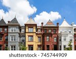 Row houses in the Washington DC neighborhood of Bloomingdale on a summer day. 