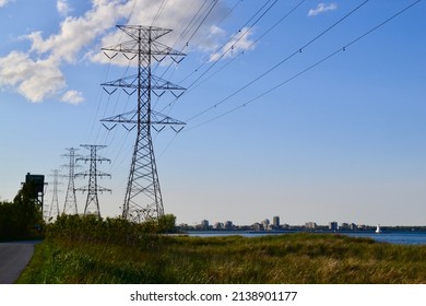 Row Of Hydro Towers Along Shore Of Lake Ontario During Spring