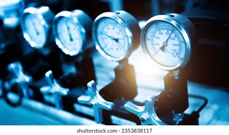 Row of industrial high pressure gas gauge meters