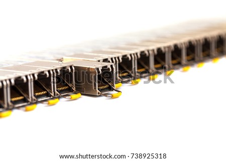Row of Internet SFP network modules for network switch. Close up. Isolated.