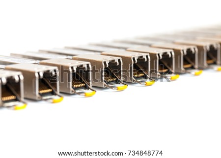 Row of Internet SFP (Small Form-factor Pluggable)  network modules for network switch. Close up. Isolated.
