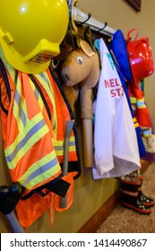 Row Of Kids Costume Coat Hooks