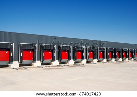 Row of loading docks with shutter doors at a warehouse