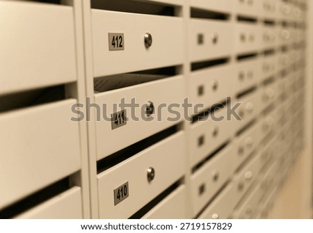 A row of mailboxes. Mailboxes. Mail and distribution. Receiving letters, notices, correspondence, etc.