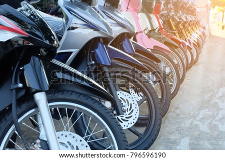 row of many motorcycle at the Showroom for sale