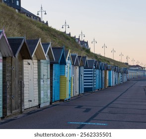 Row of multi colored beach huts on the south beach at Lowestoft, UK