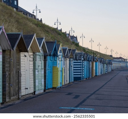 Row of multi colored beach huts on the south beach at Lowestoft, UK