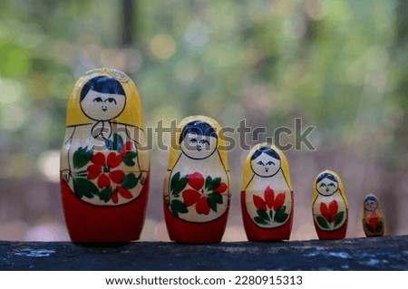 A row of nesting dolls in close-up. Slavic culture. Matryoshka.