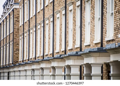 Row Of New Build Brick Homes In The England, UK