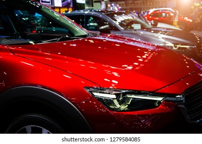 Row of new  cars on display at the Motor  motor exhibition show event of technology and  innovation of vehicle or transportation.
