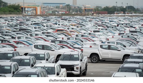 Row of new cars for sale in port. New automobiles background - Shutterstock ID 2024553146