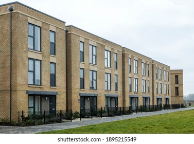 A row of newly completed flats in Trumpington Meadows,  South Cambridge, UK - Shutterstock ID 1895215549