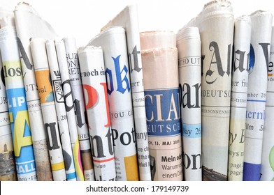 Row of newspapers - Shutterstock ID 179149739