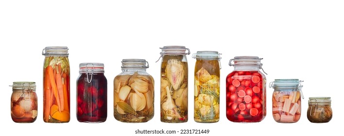 Row of nine glass canning jars with preserved vegetables isolated on a white background - Powered by Shutterstock