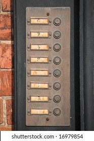 Row Of Numbered Door Bell Buttons