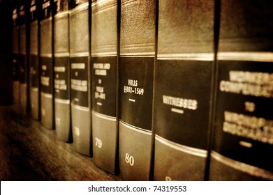 Row of old leather law books about Wills and Estates on a shelf