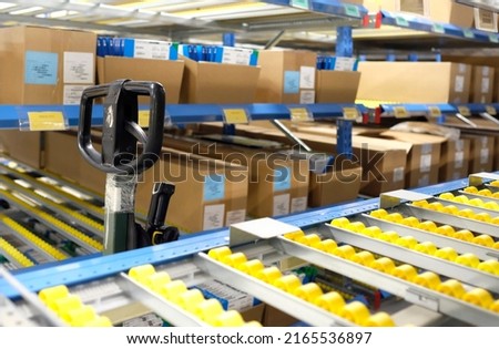 Row of packages inside a logistics and distribution center