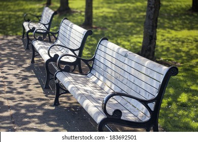 Row Of Park Benches At Portland Oregon Downtown Waterfront Park