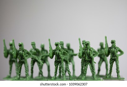 Row Of Plastic Little Green Army Men, Close Up.