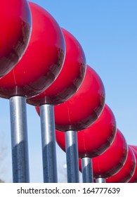 Row Of Red Balls At Contemporary Light Rail Station In Denver, Colorado.