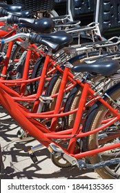 Row Of Red Bicycles In A Bike Rental Shop