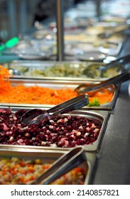 A Row Of Salads On Trays With An Assortment Of Vitamins On A Food Distribution Line. Rich English Buffet Breakfast In The Resort's Dining Room.