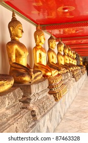 A row of seated Buddhas