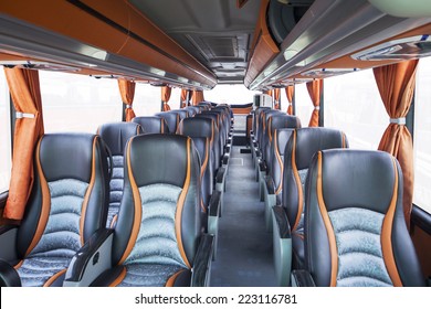 Row of seats inside tourist bus, shot in exhibition