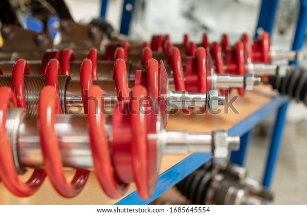A row of shock absorbers\
for car