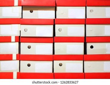 Row Of Shoes Box Stacked In Storage, Close Up, Stock Concept